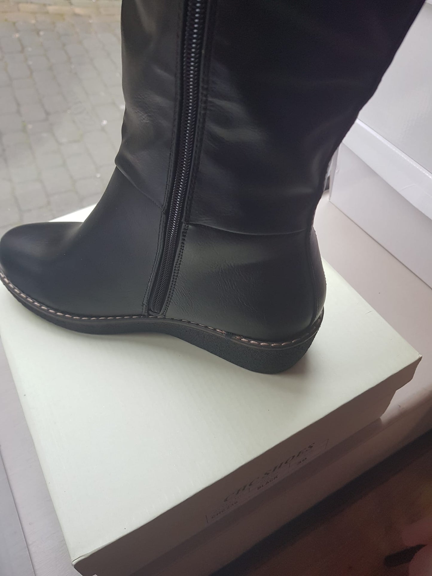 Black wedge boot